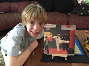 Seth and his karate Woodific photo on a wooden easel.