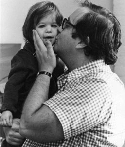 Carolyn, age 3, with her father.